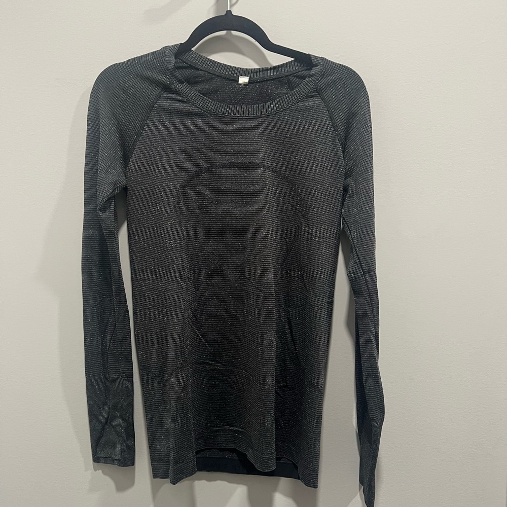 Lululemon Size 10 Swiftly Tech Long Sleeved Top. Black with silver shimmer.